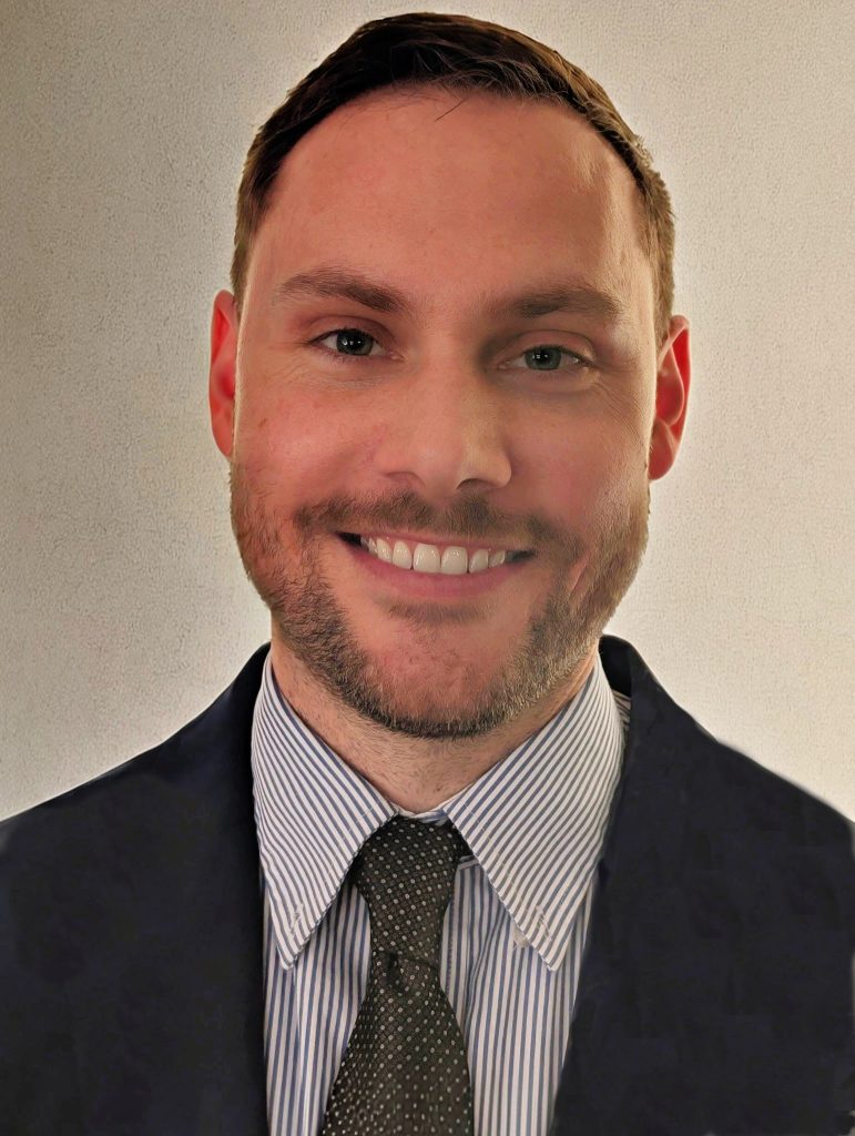 A photo is seen of Mr. Colin Selby